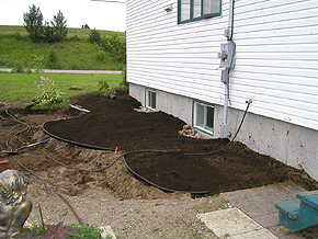 Flower bed around house